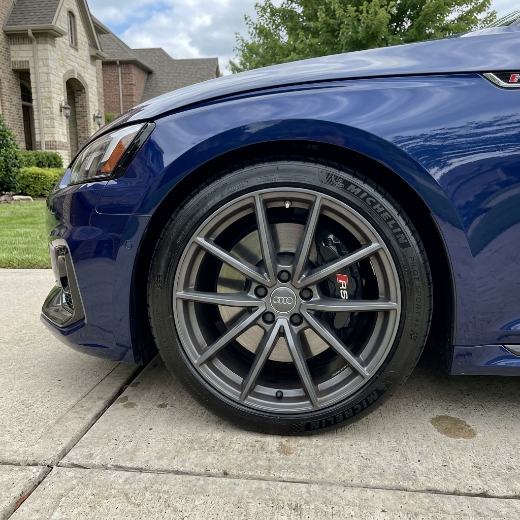 Blue Audi RS wheel and tire detail — Round Rock Mobile Detailing